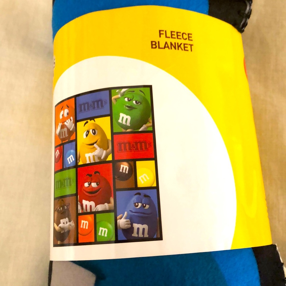 Perfect for a morale boost. NWT M&M blanket